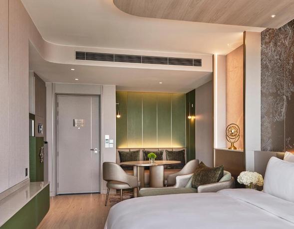 Imagen de la habitación del Hotel Grande Centre Point Voyage Pattaya. Foto 8
