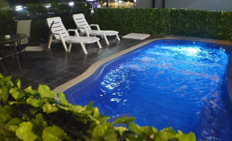 Imagen de la piscina del Hotel Grande Elegance Serviced Apartment. Foto 16