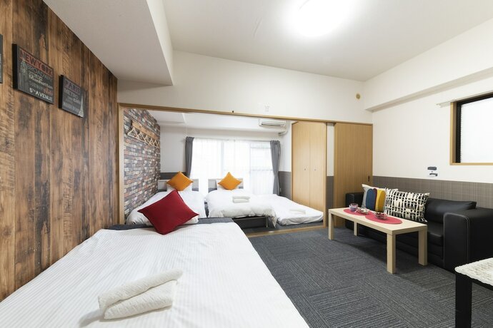 Imagen de la habitación del Hotel Grande Famille Shimanouchi Dotonbori Condo. Foto 12