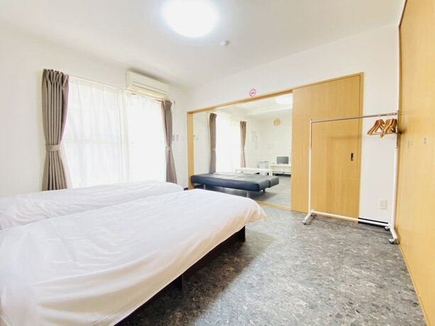 Imagen de la habitación del Hotel Grande Famille Shimanouchi Dotonbori Condo. Foto 13
