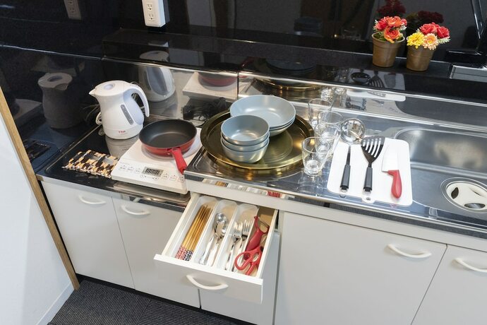 Imagen de la habitación del Hotel Grande Famille Shimanouchi Dotonbori Condo. Foto 14