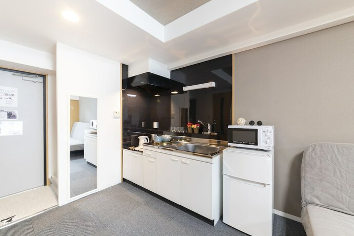 Imagen de la habitación del Hotel Grande Famille Shimanouchi Dotonbori Condo. Foto 15