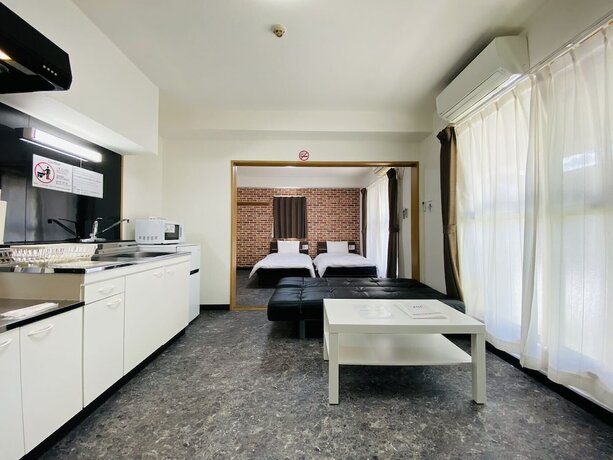 Imagen de la habitación del Hotel Grande Famille Shimanouchi Dotonbori Condo. Foto 19