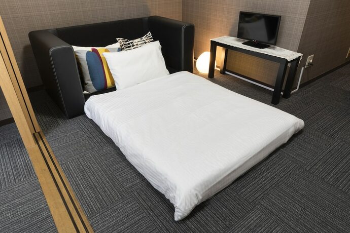 Imagen de la habitación del Hotel Grande Famille Shimanouchi Dotonbori Condo. Foto 26