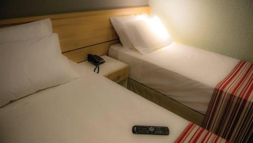 Imagen de la habitación del Hotel Grande Ipatinga. Foto 7