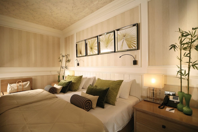 Imagen de la habitación del Hotel Grande Real Villa Italia. Foto 9