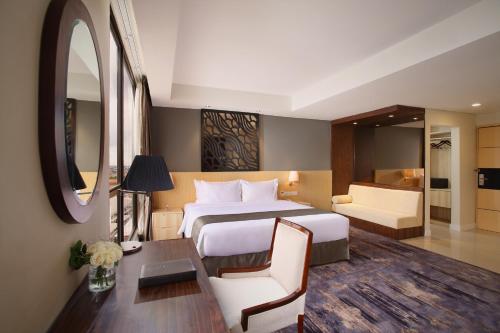 Imagen de la habitación del Hotel Grandhika Semarang. Foto 4