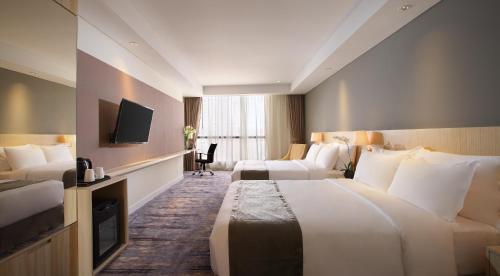 Imagen de la habitación del Hotel Grandhika Semarang. Foto 5