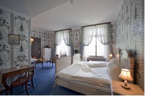 Imagen de la habitación del Hotel Grandhotel Giessbach. Foto 14