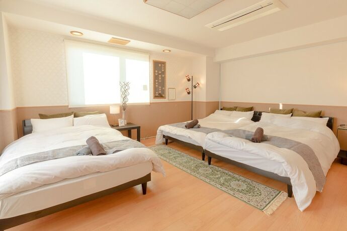 Imagen de la habitación del Hotel Grandioso Nakano. Foto 22