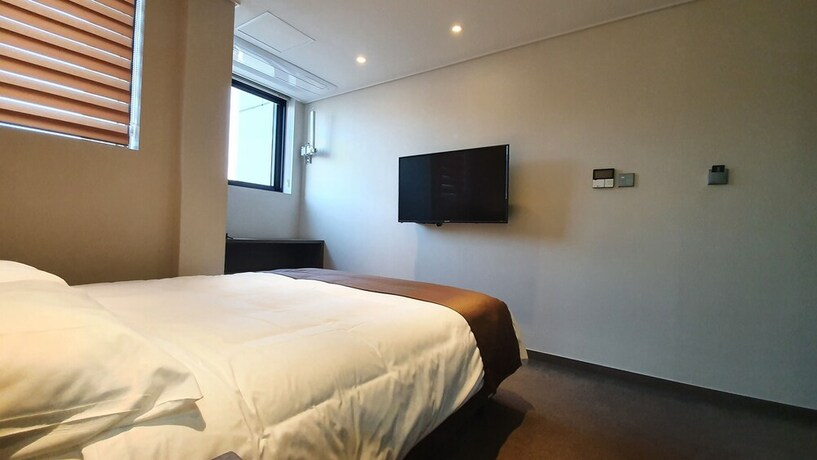 Imagen de la habitación del Hotel Grandmillions. Foto 12