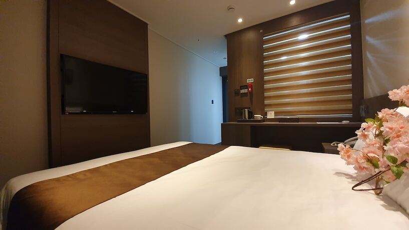 Imagen de la habitación del Hotel Grandmillions. Foto 13