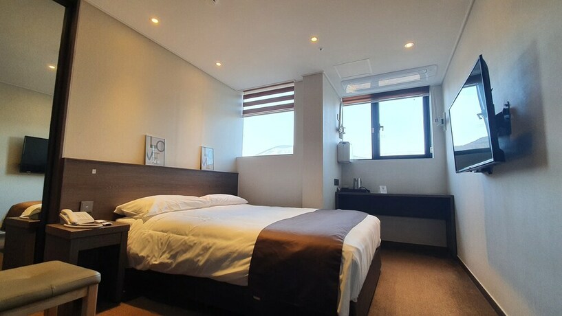 Imagen de la habitación del Hotel Grandmillions. Foto 14