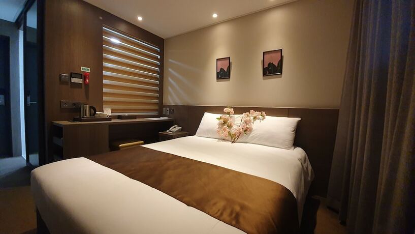 Imagen de la habitación del Hotel Grandmillions. Foto 16
