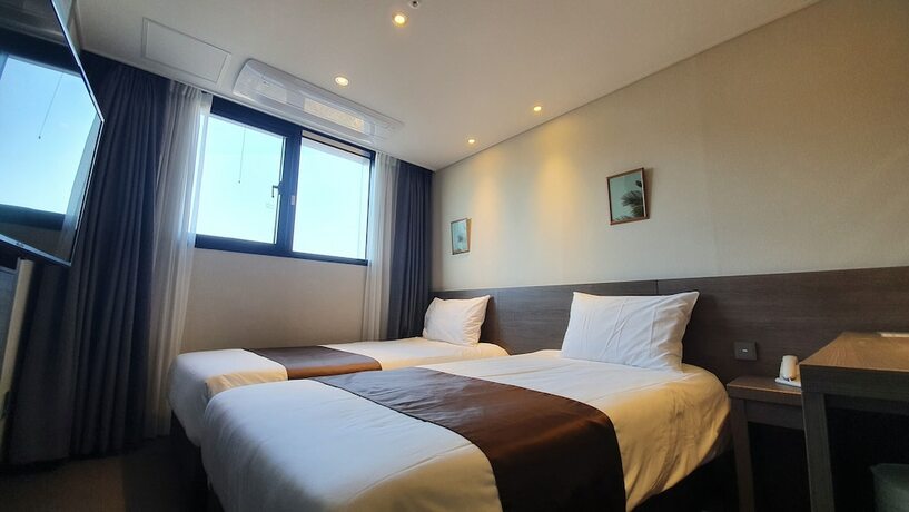 Imagen de la habitación del Hotel Grandmillions. Foto 17
