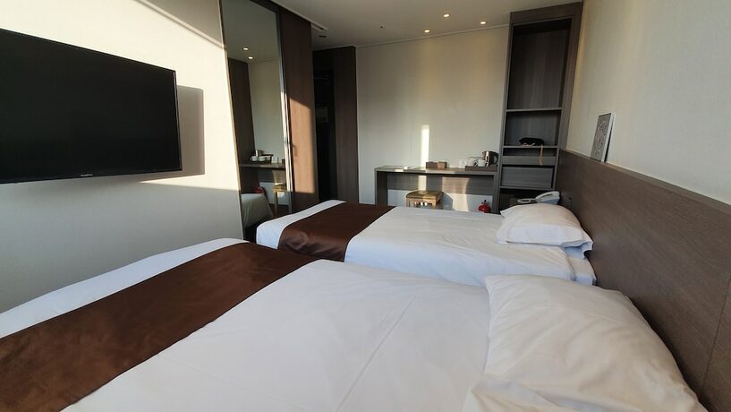 Imagen de la habitación del Hotel Grandmillions. Foto 18