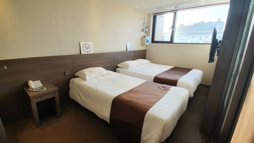 Imagen de la habitación del Hotel Grandmillions. Foto 21