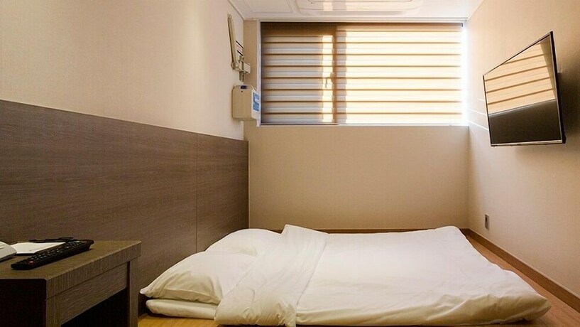 Imagen de la habitación del Hotel Grandmillions. Foto 23