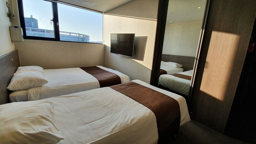 Imagen de la habitación del Hotel Grandmillions. Foto 24