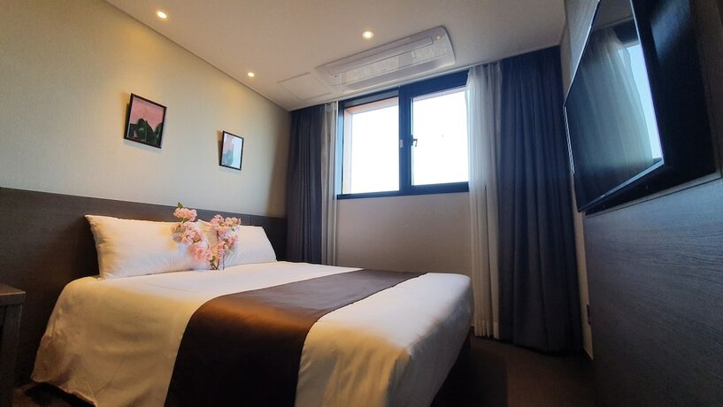 Imagen de la habitación del Hotel Grandmillions. Foto 27
