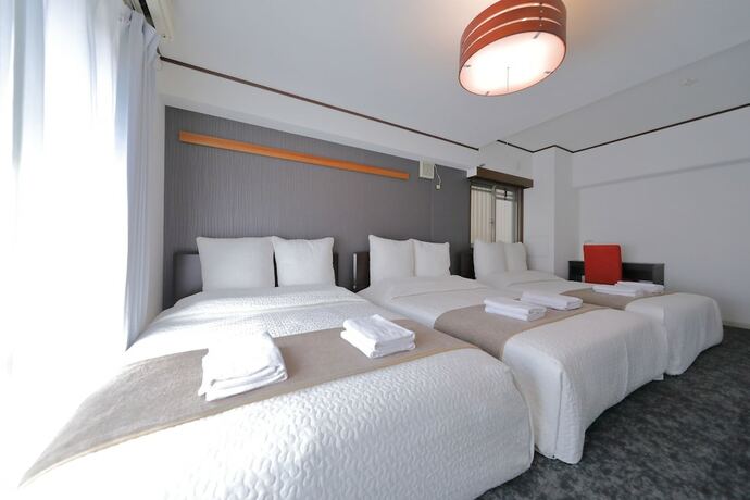 Imagen de la habitación del Hotel Grandouce Dotonbori Riverside. Foto 17
