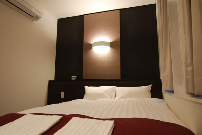 Imagen de la habitación del Hotel Grandouce Himeji. Foto 12