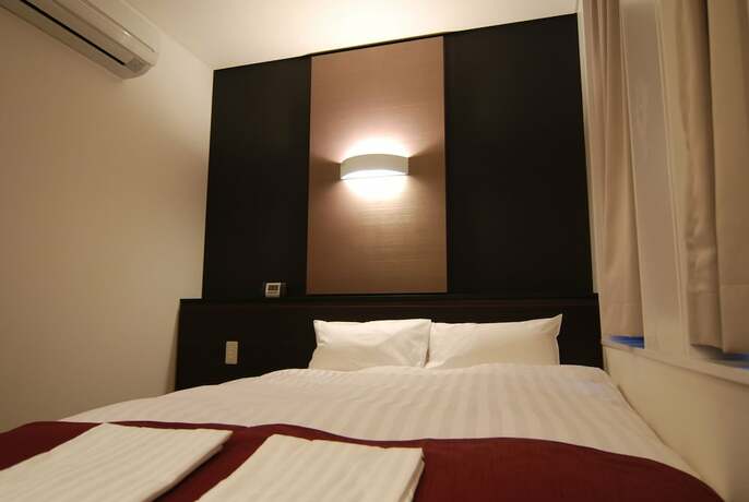 Imagen de la habitación del Hotel Grandouce Himeji. Foto 22
