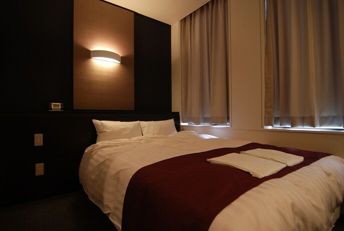 Imagen de la habitación del Hotel Grandouce Himeji. Foto 25