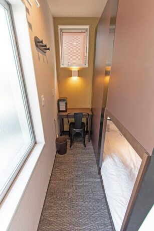 Imagen de la habitación del Hotel Grandouce Kamata I - Hostel, Caters to Men. Foto 11