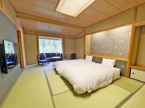 Imagen de la habitación del Hotel Grandvrio Unazukionsen. Foto 11