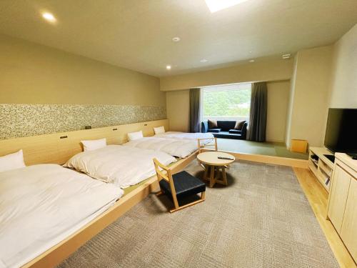 Imagen de la habitación del Hotel Grandvrio Unazukionsen. Foto 12