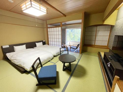 Imagen de la habitación del Hotel Grandvrio Unazukionsen. Foto 16