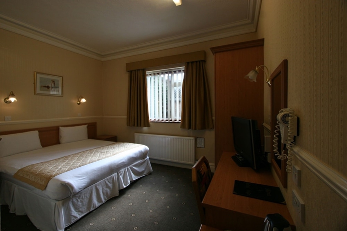 Imagen de la habitación del Hotel Grange Moor. Foto 6