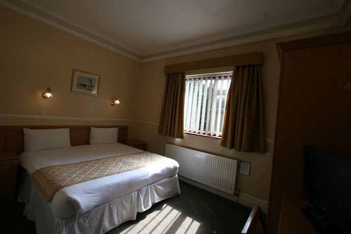 Imagen de la habitación del Hotel Grange Moor. Foto 12