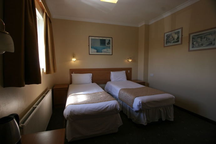 Imagen de la habitación del Hotel Grange Moor. Foto 16