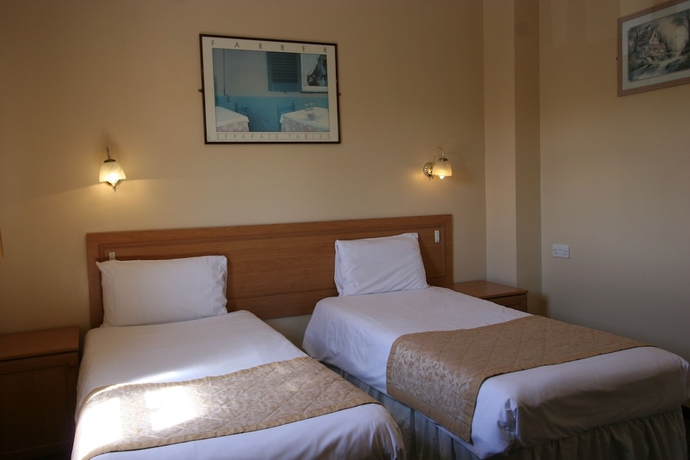 Imagen de la habitación del Hotel Grange Moor. Foto 17