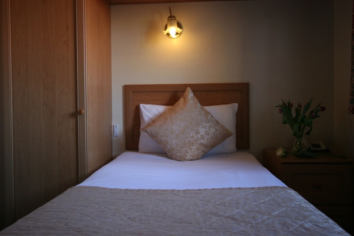 Imagen de la habitación del Hotel Grange Moor. Foto 18
