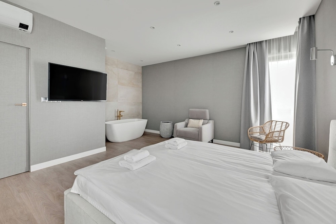 Imagen de la habitación del Hotel Grano Solmarina Spa And Wellness. Foto 11