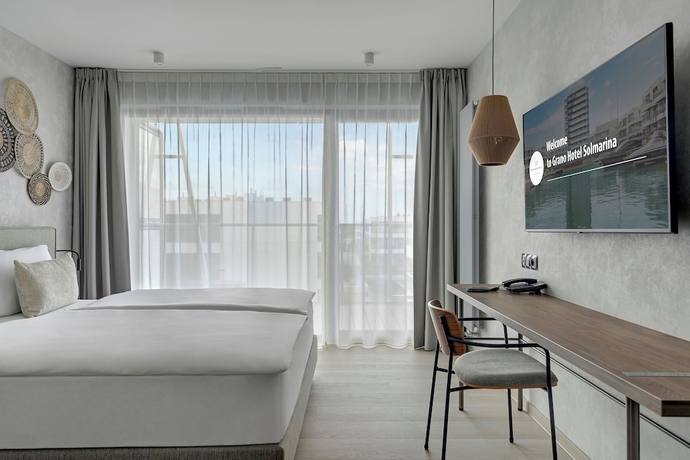 Imagen de la habitación del Hotel Grano Solmarina Spa And Wellness. Foto 17