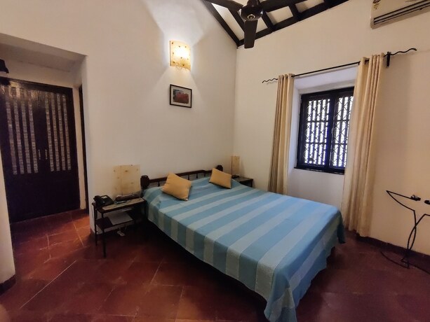 Imagen de la habitación del Hotel Granpa\'s Inn Bougainvillea. Foto 15