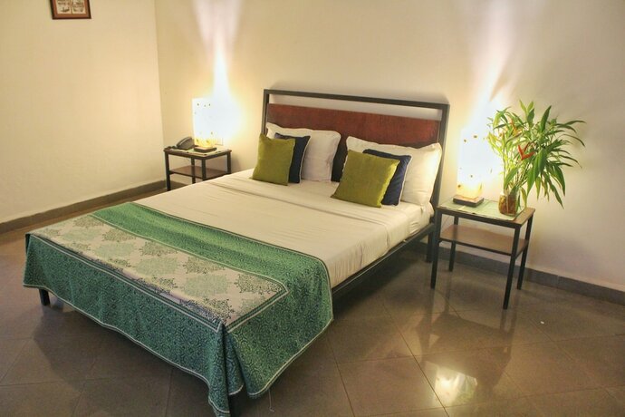 Imagen de la habitación del Hotel Granpa\'s Inn Bougainvillea. Foto 20