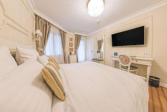 Imagen de la habitación del Hotel Grant Boutique. Foto 13