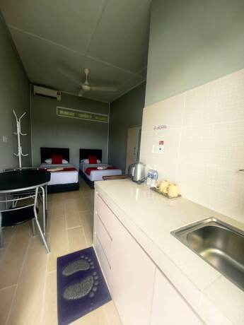 Imagen de la habitación del Hotel Grapevine Garden. Foto 19