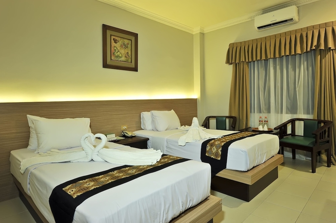 Imagen de la habitación del Hotel Grasia Semarang. Foto 9