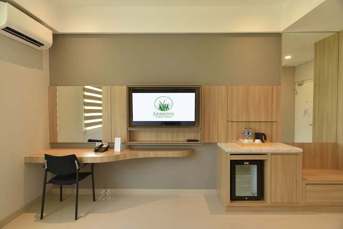 Imagen de la habitación del Hotel Grass Inn Solo. Foto 7
