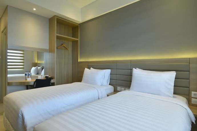 Imagen de la habitación del Hotel Grass Inn Solo. Foto 8