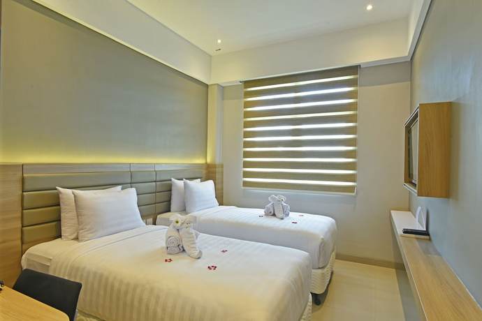 Imagen de la habitación del Hotel Grass Inn Solo. Foto 10