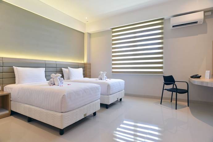 Imagen de la habitación del Hotel Grass Inn Solo. Foto 11