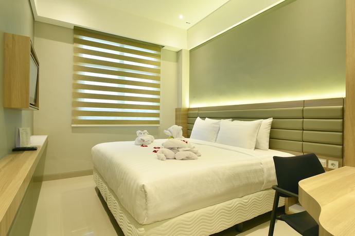 Imagen de la habitación del Hotel Grass Inn Solo. Foto 14