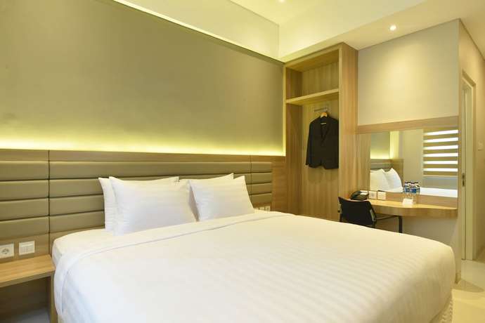 Imagen de la habitación del Hotel Grass Inn Solo. Foto 16